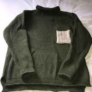 Green turtleneck sweater